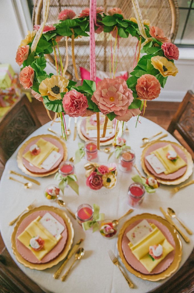 The floral chandelier was made up of paper flowers created by Piggy Bank Parties.