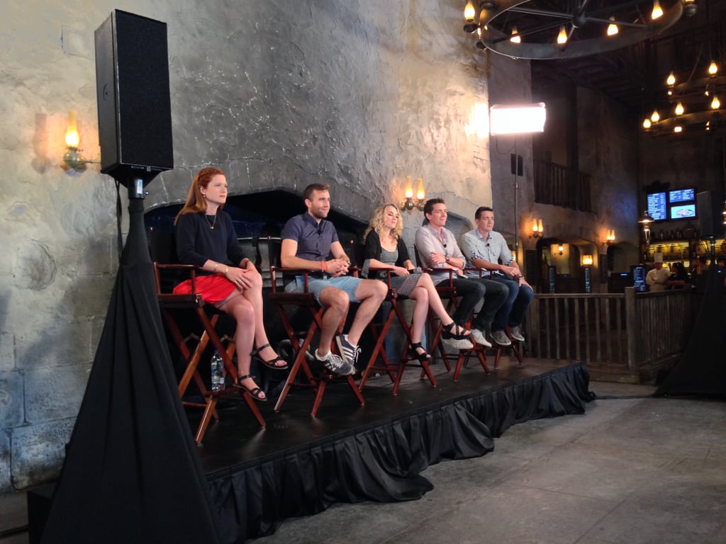 Bonnie Wright, Matt Lewis, Evanna Lynch, James Phelps, and Oliver Phelps sat together for a panel in The Leaky Cauldron restaurant.