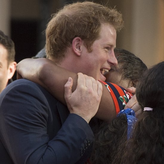 Prince Harry Hugged at a London Screening | Pictures