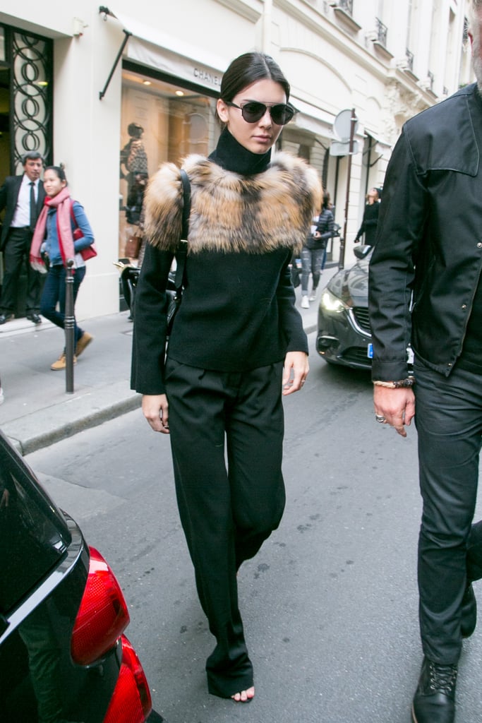 Kendall seemed to be channeling Karl Lagerfeld in all black leaving the Chanel office in Paris.