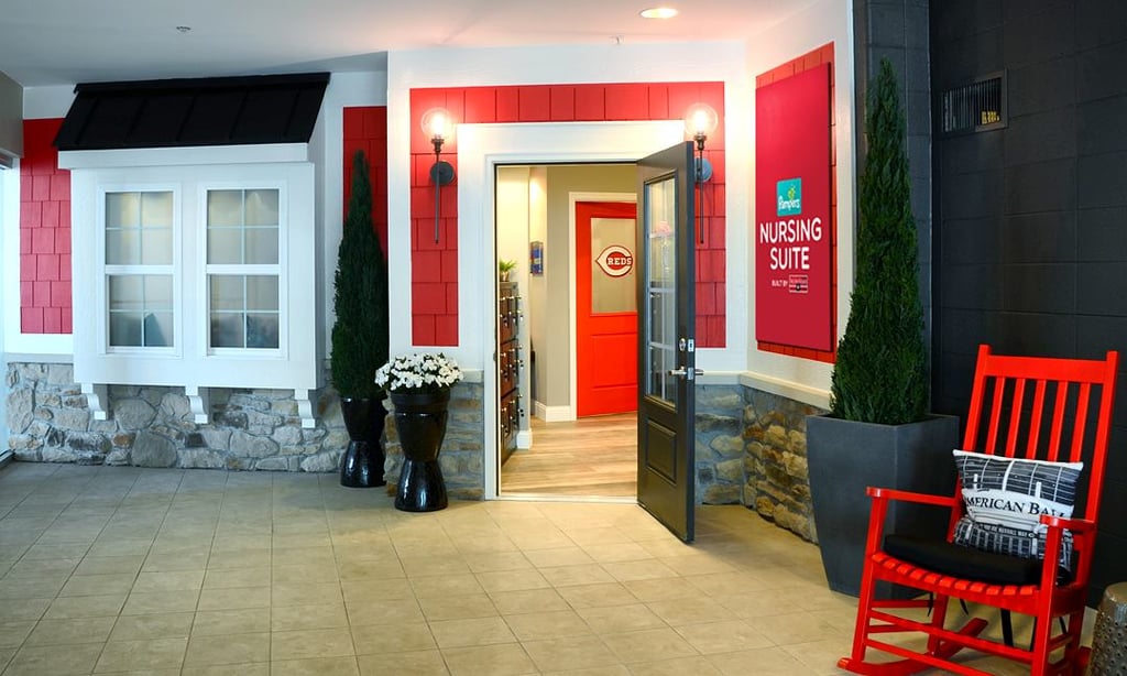 Rocking chairs and a homey decor scheme will help families to feel at home in the suite.