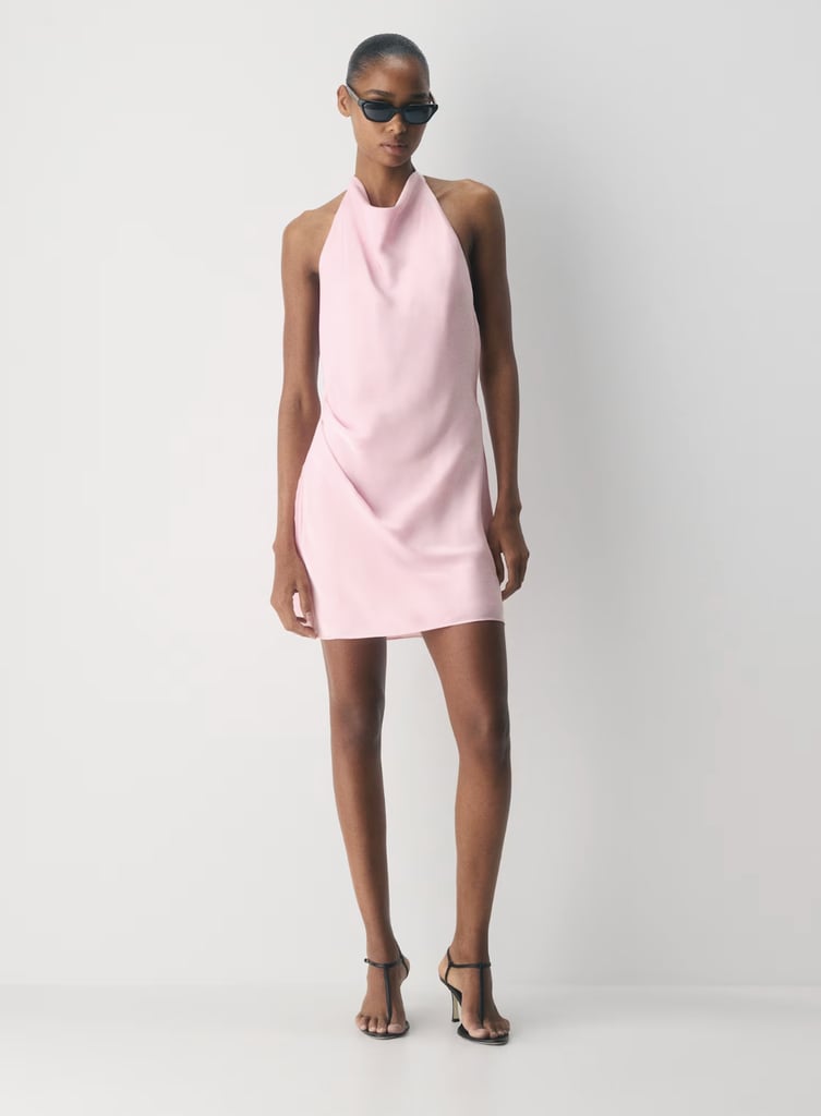 Aritzia Ten Audience Satin Mini Halter Dress ($110, originally $138)
If you too swear by Aritzia for wardrobe staples, you'll want to take advantage of their summer sale, offering up to 50 percent off everything. At the top of my list is this super-chic halter dress that comes in every color from black to milkshake pink.