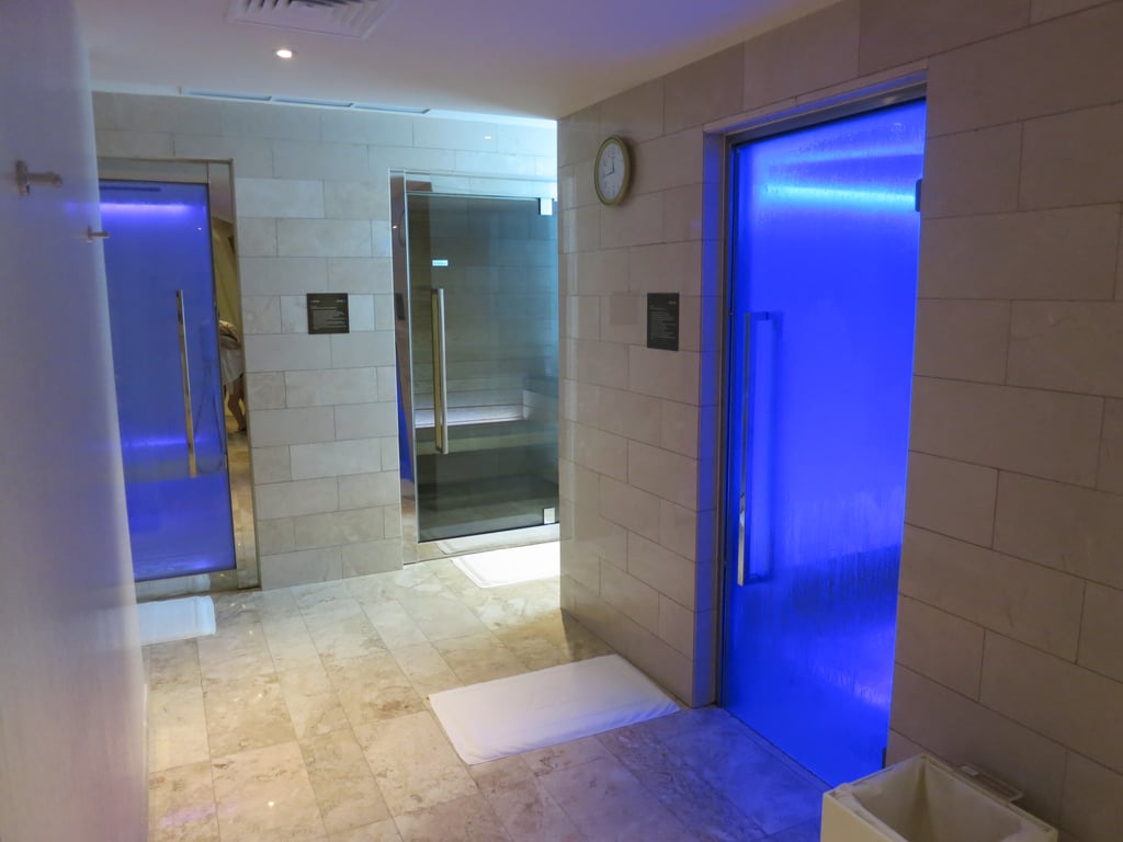 After, we were led to a private bathroom featuring different saunas, steam rooms, and even an ice room. Color-changing chakras enhanced the head-clearing experience.