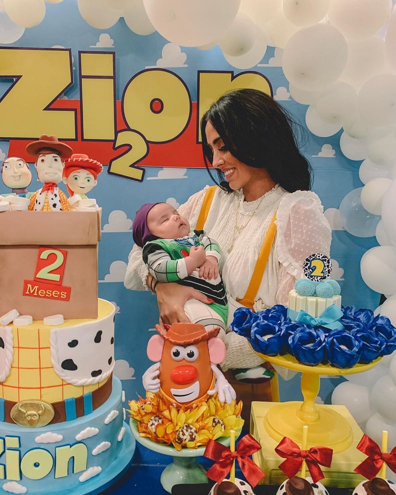Zion With His Cake and Dressed as Buzz