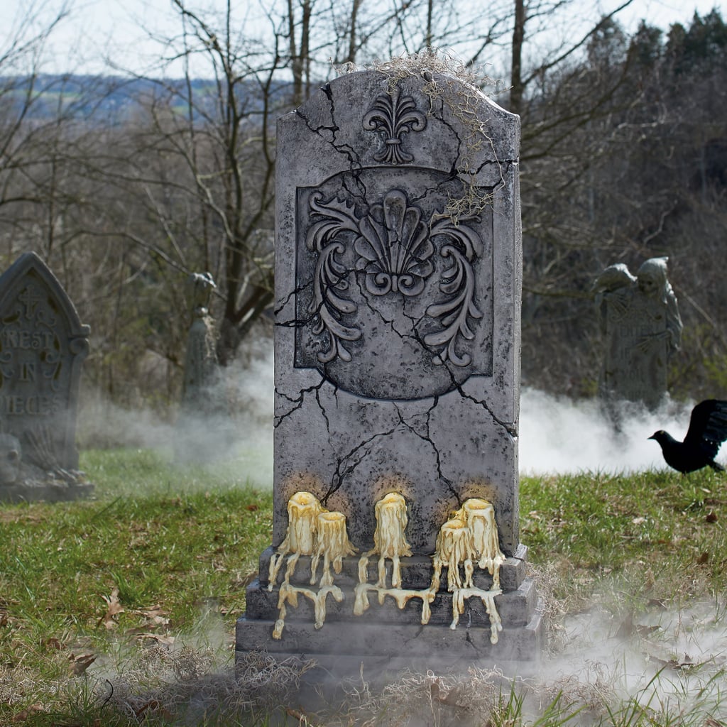 Tombstone With Melting Candles