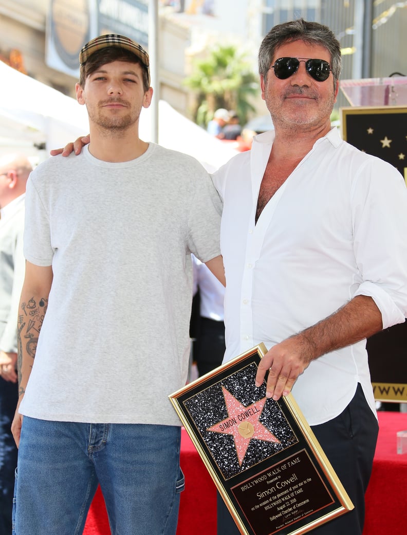 Louis Tomlinson and Simon Cowell