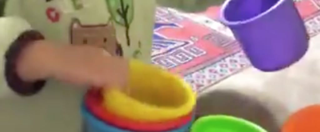 Girl Stacking Nesting Cups Video