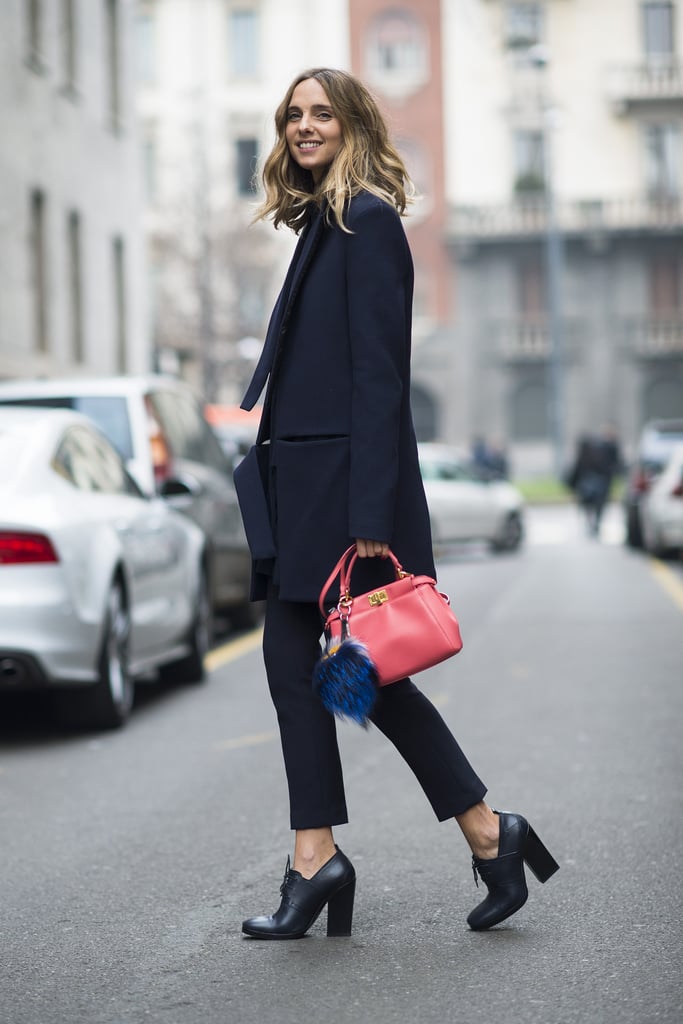 A bright bag and furry Fendi charm gave this menswear-inspired look a girl's touch. 
Source: Le 21ème | Adam Katz Sinding