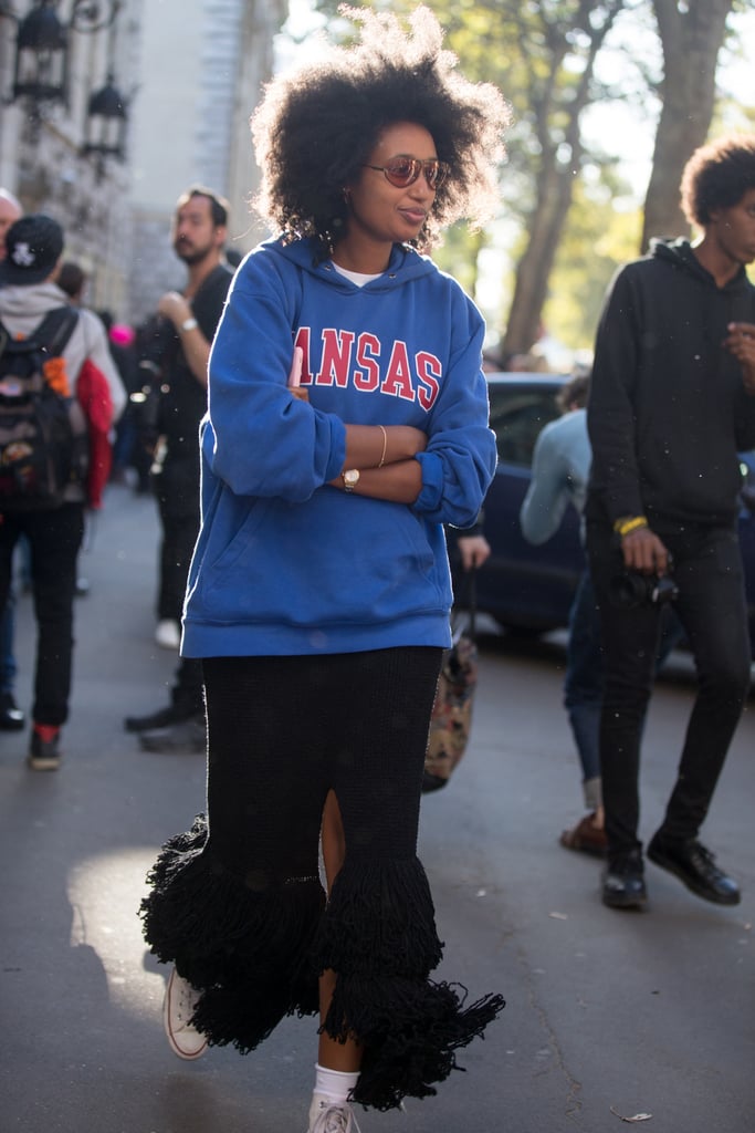 Wear a Frilly Skirt With a Collegiate Sweatshirt and Converse