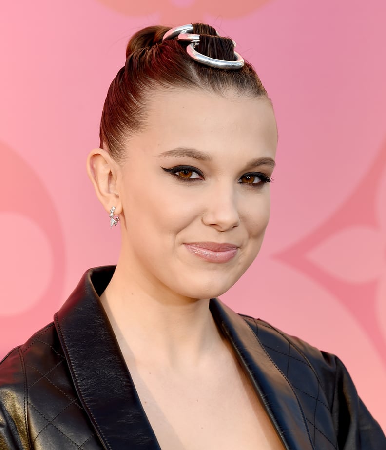 Millie Bobby Brown's Metal Ring Accessorized Bun, 2019