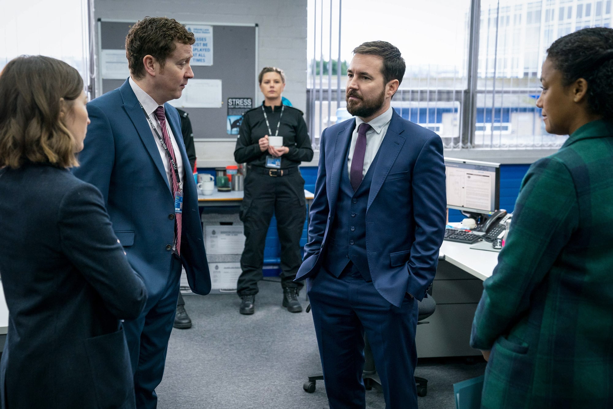 Programme Name: Line of Duty S6 - TX: n/a - Episode: Line Of Duty - Ep 2 (No. n/a) - Picture Shows:  Supporting Artist, DCI Joanne Davidson (KELLY MACDONALD), DCI Ian Buckells (NIGEL BOYLE), DS Steve Arnott (MARTIN COMPSTON), DC Chloe Bishop (SHALOM BRUNE-FRANKLIN) - (C) World Productions - Photographer: Steffan Hill