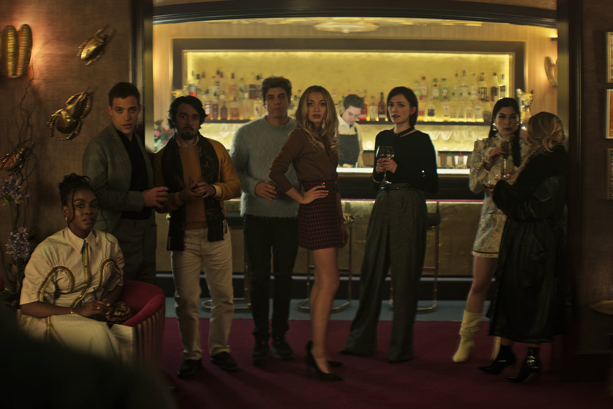 You. (L to R) Ozioma Whenu as Blessing, Ben Wiggins as Roald, Dario Coates as Connie, Lukas Gage as Adam, Tilly Keeper as Lady Phoebe, Charlotte Ritchie as Kate and Niccy Lin as Sophie Soo in episode 403 of You. Cr. Courtesy of Netflix © 2022