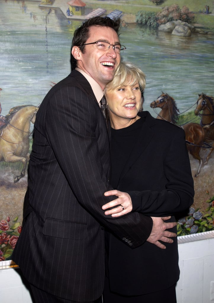 Hugh held onto his wife during the National Board of Review awards in NYC in January 2002.