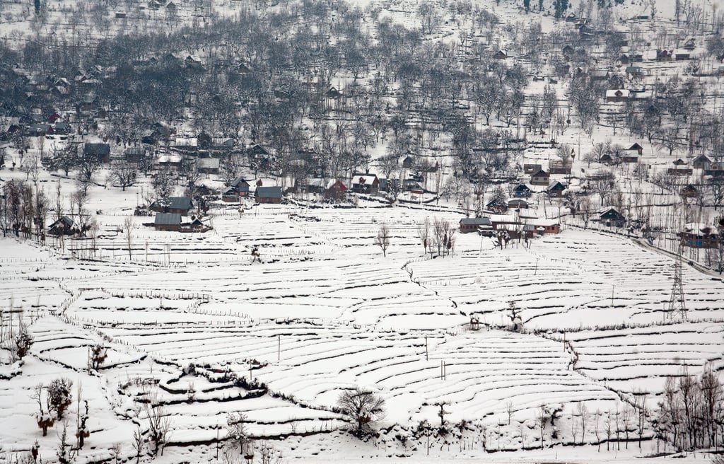 Snow blanketed the houses in Kashmir, India.