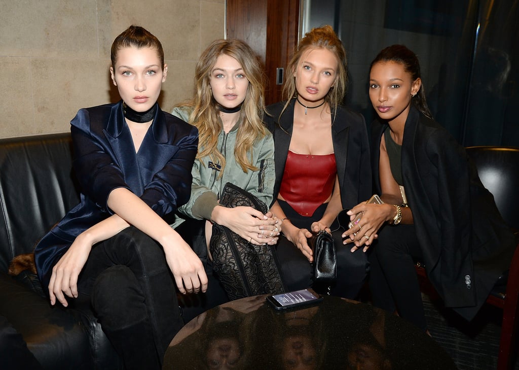 Gigi and Bella wore thick black chokers — Bella completing her Are You Am I style with a satin blazer and Gigi with a slick bomber — when they hit up the Yeezy Season 3 show. They hung out backstage with models Romee Strijd and Jasmine Tookes.