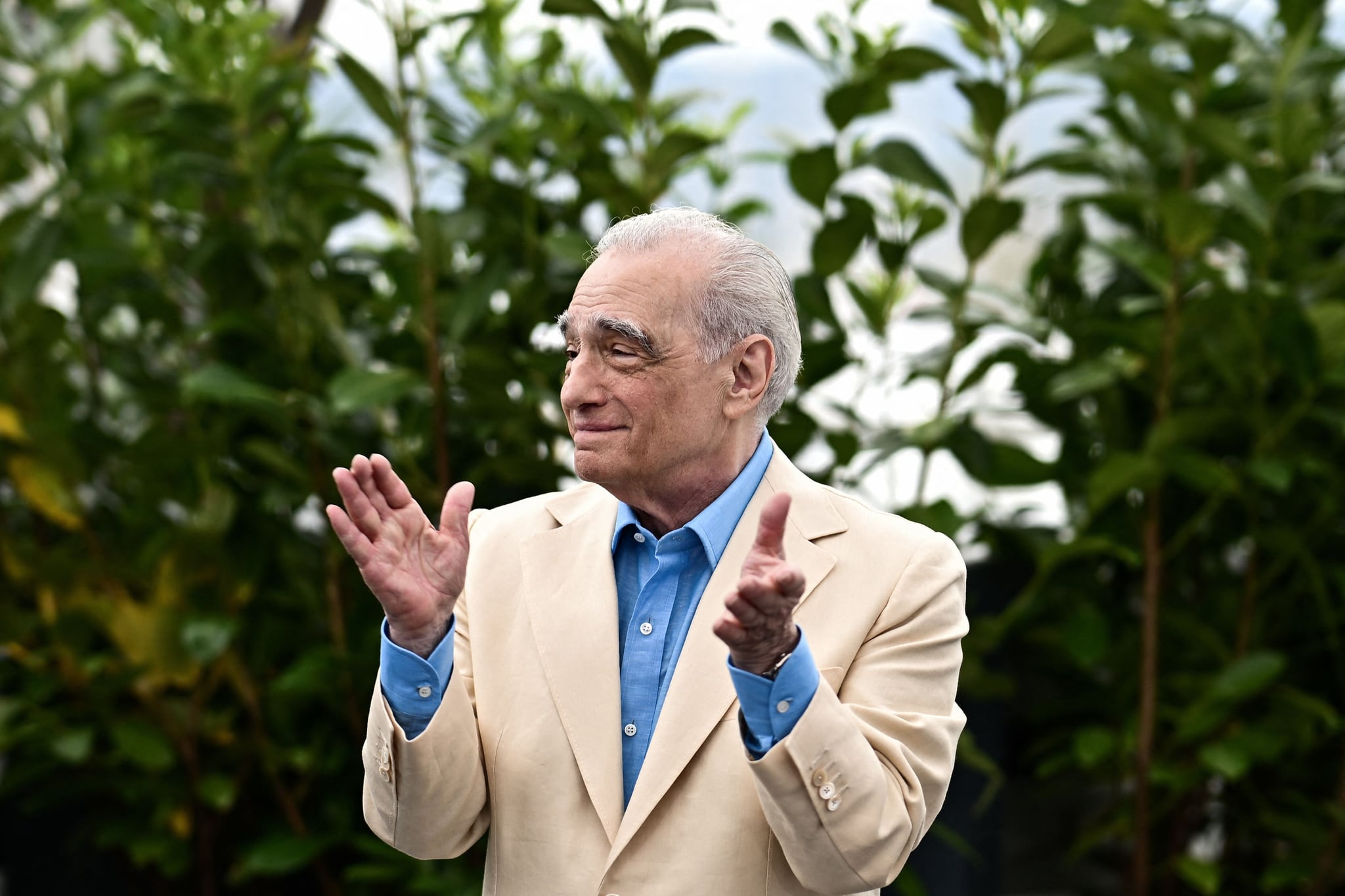 US director Martin Scorsese applauds during a photocall for the film 