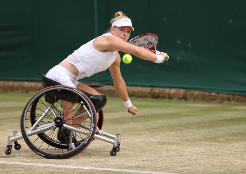 LONDON, ENGLAND - JULY 08: Diede De Groot of The Netherlands stretches to play a backhand in her Ladies' Wheelchair Singles Quarter-Final match against Lucy Shuker of Great Britain on Day Ten of The Championships - Wimbledon 2021 at All England Lawn Tenni