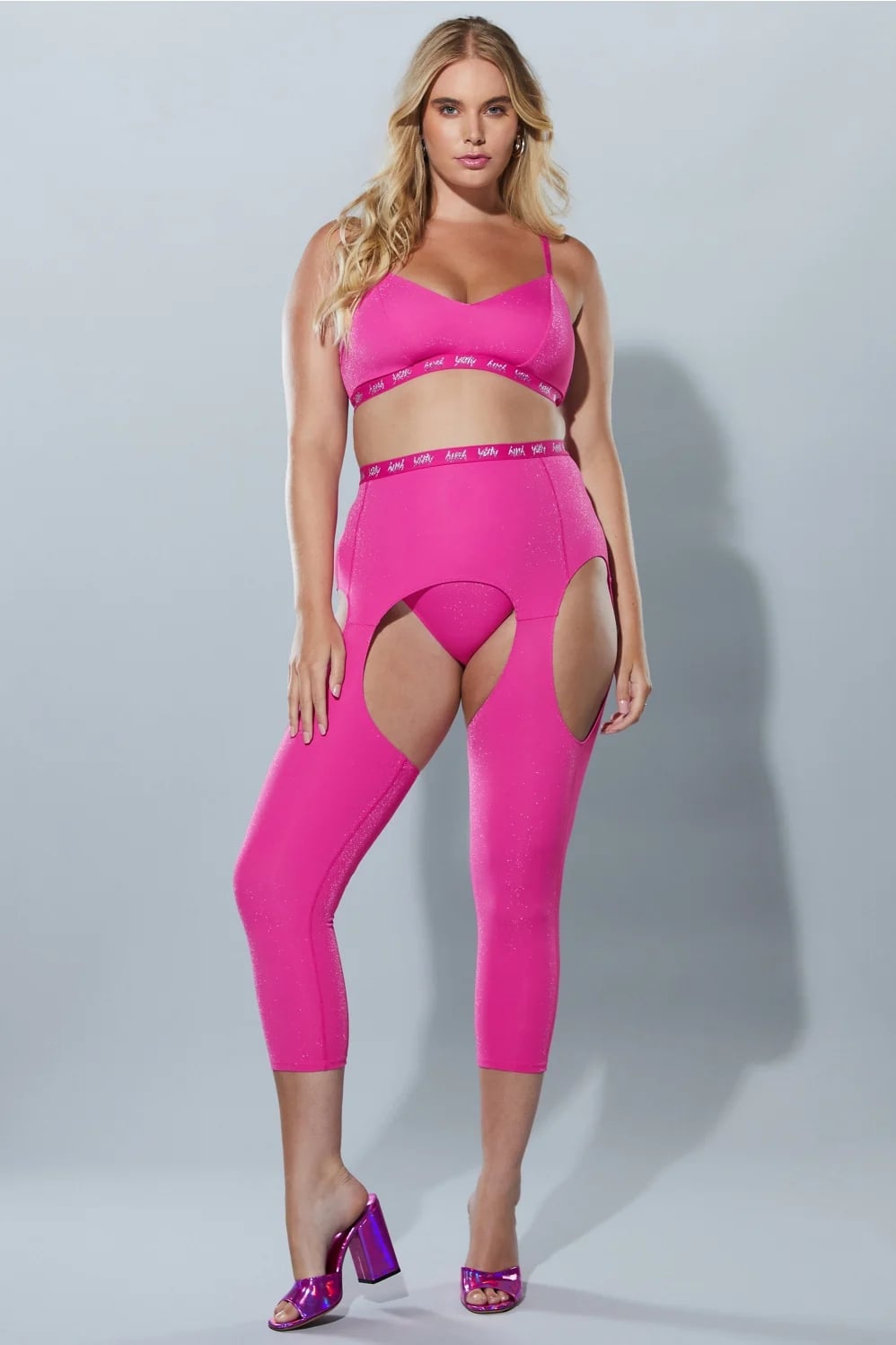 Shop Lizzo's Yitty Look, Lizzo Dances in Bum-Cutout Leggings and a  Matching Pink Bra