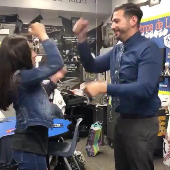 Student and Teacher Greet Each Other With Special Handshake