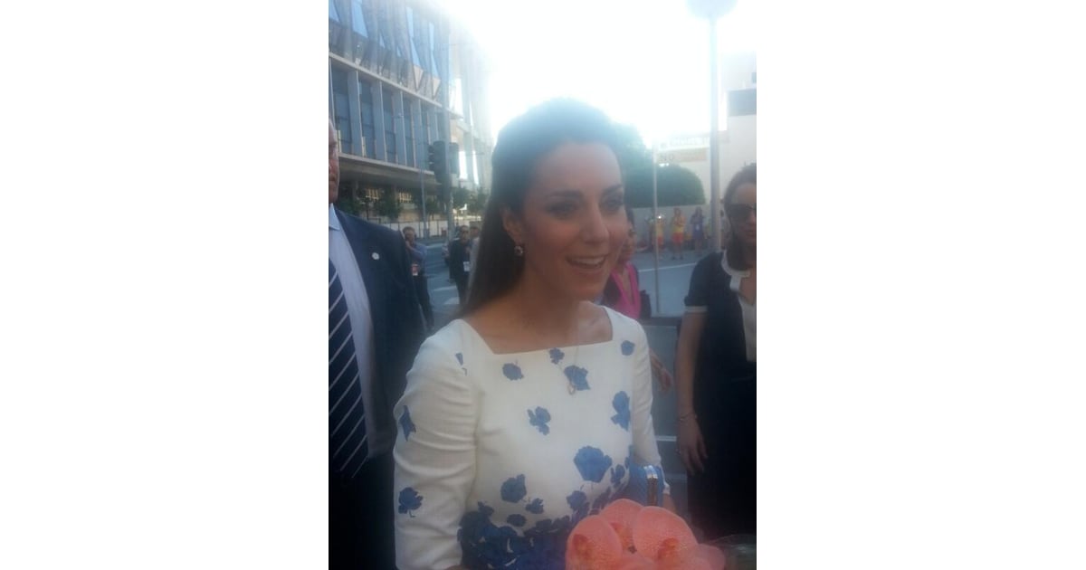 Kate was given flowers by fans in Brisbane. Go Behind the Scenes of