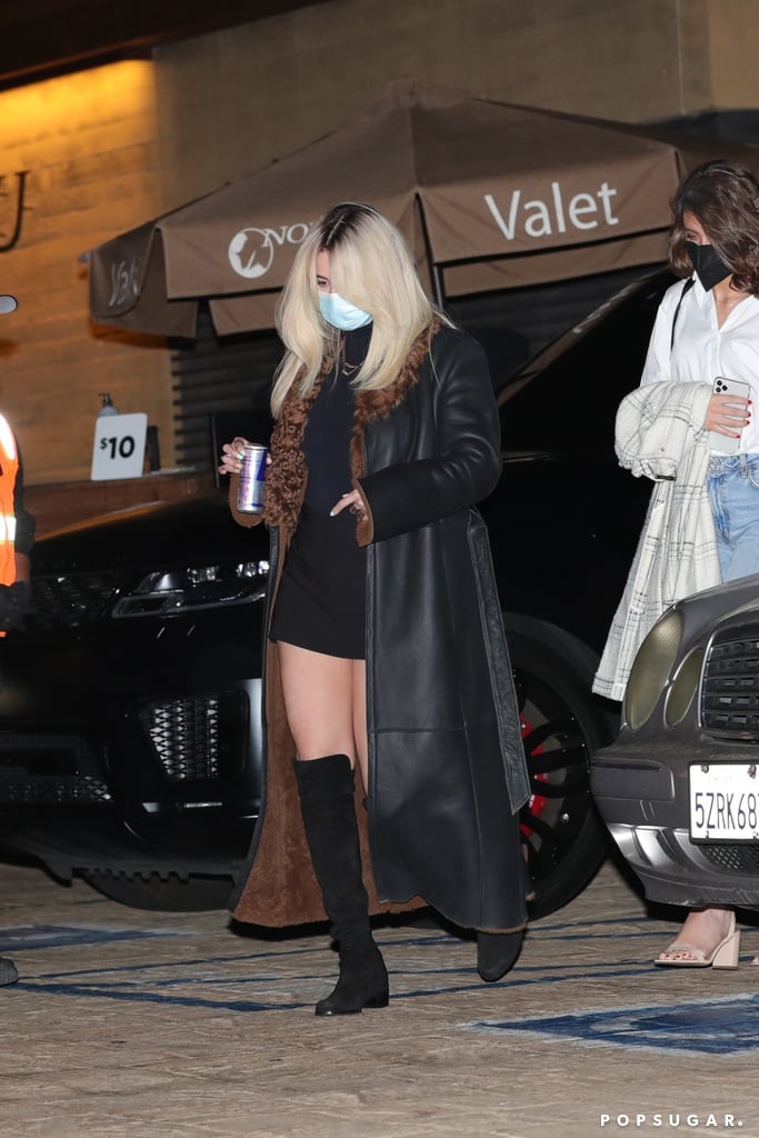 Selena Gomez's Black Miniskirt With a Shearling Trench Coat