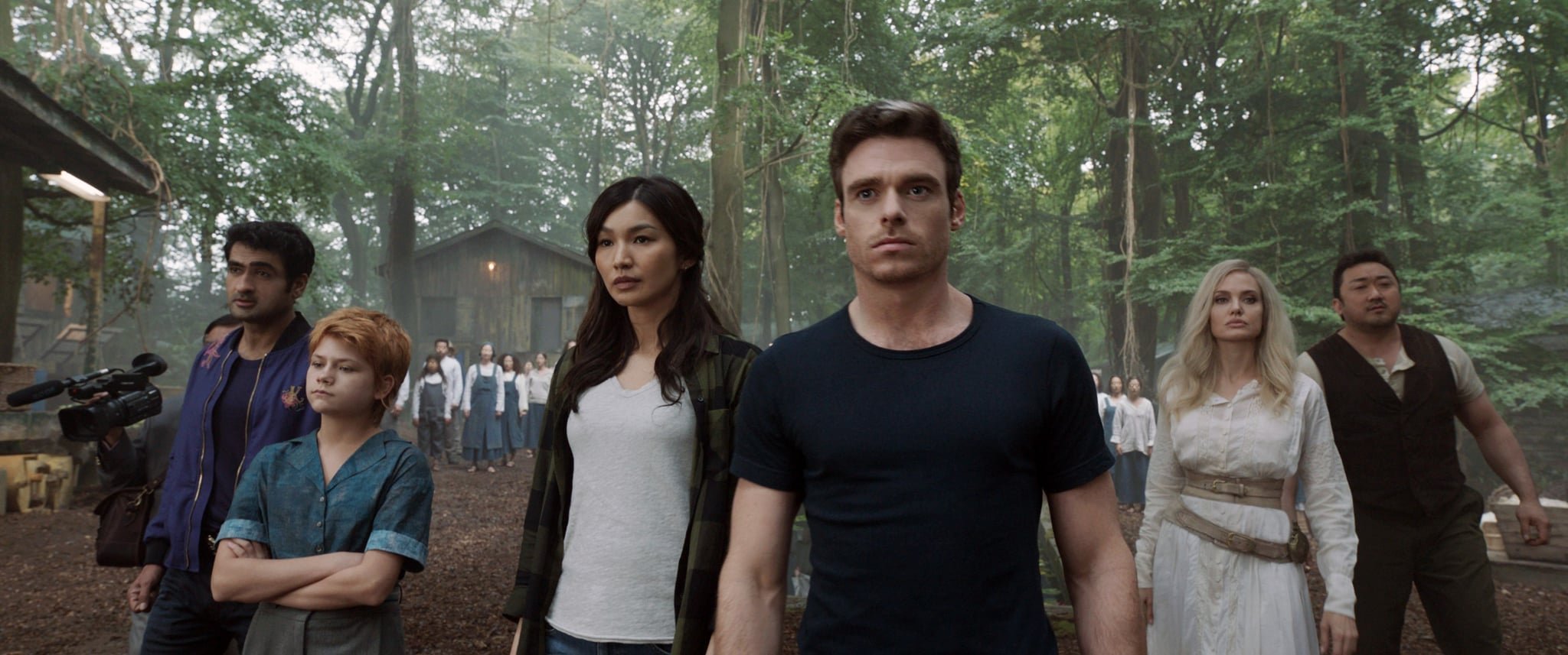 ETERNALS, from left: Kumail Nanjiani as Karun, Lia McHugh as Sprite, Gemma Chan as Sersi, Richard Madden as Ikaris, Angelina Jolie as Thena, Ma Dong-seok as Gilgamesh, 2021.  Walt Disney Studios Motion Pictures /  Marvel Studios / Courtesy Everett Collection