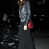 We love the way Miranda winterizes her maxi — a quilted leather jacket and fedora give it that seasonal cool factor.