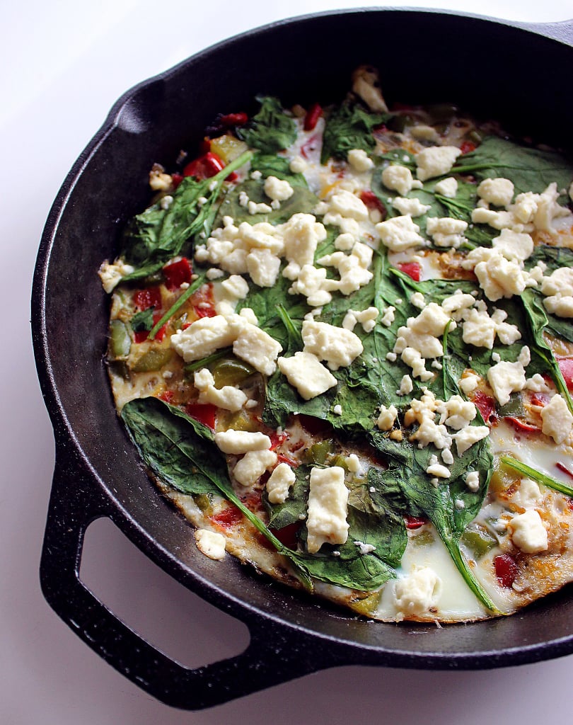 Fast Frittatas
Frittatas are one of the easiest (one pan, yeah!), quickest, and healthiest meals to get on the table, says Katherine Brooking, MS, RD, cofounder of Appetite For Health. "Eggs pair perfectly with veggies, so you can use pretty much any veggies you have on hand. Some of my favorite combinations include kale, chicken sausage, and mushrooms or this spinach, mushroom, and leek frittata recipe."
Perfect Panzanella
I make a fresh and satisfying panzanella or Tuscan bread salad at least once a week. I usually don’t have a loaf of stale bread available, so I simply bake chunks of any artisan whole-wheat bread. I use tomatoes, red onion, cucumber, and bell pepper, and dress with olive oil and vinegar. Sometimes, I’ll mix in cooked diced chicken (from a salad bar) for protein. Here’s an easy panzanella recipe that you have to try!