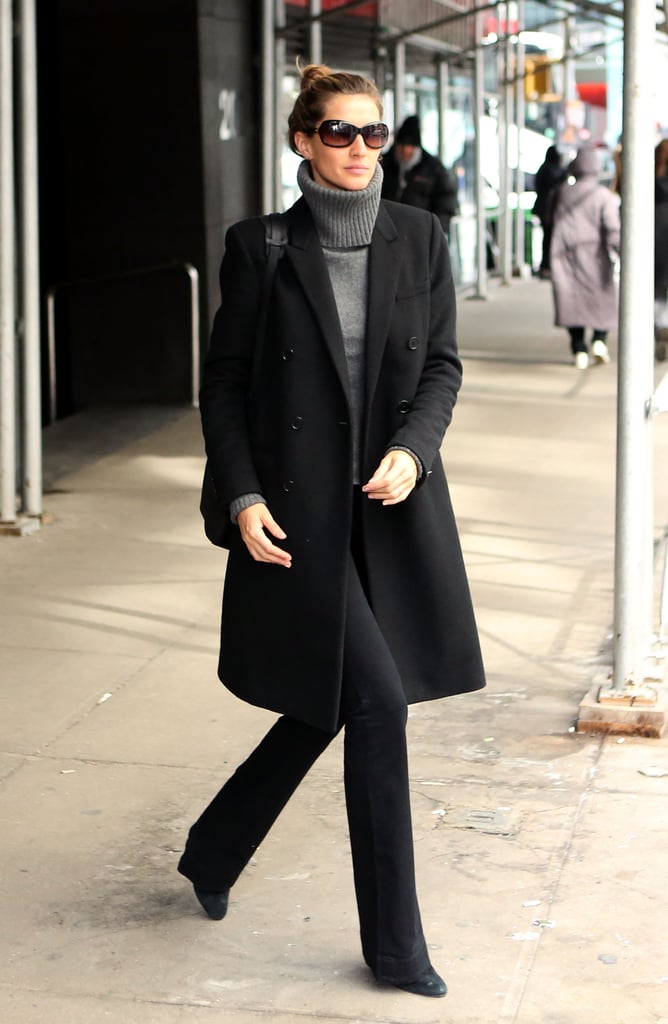 Gisele Bündchen kept her look low key with a gray turtle neck, black coat, and black pants.