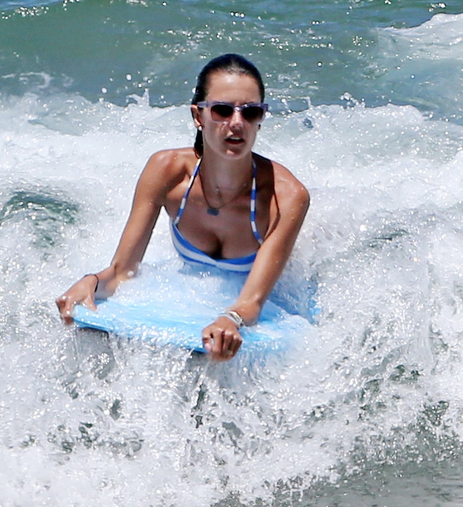 Alessandra Ambrosio rode waves in Maui on Sunday.