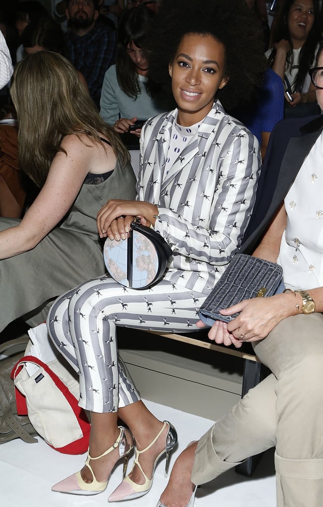 While sitting front row at the Suno show in NYC, Solange worked a classic gray-and-white pinstriped suit, but upon closer inspection, we also spotted little two-toned horses. Her sophisticated clutch doubled as a map, and her polished pumps were reminiscent of a childhood favorite: Neapolitan ice cream.