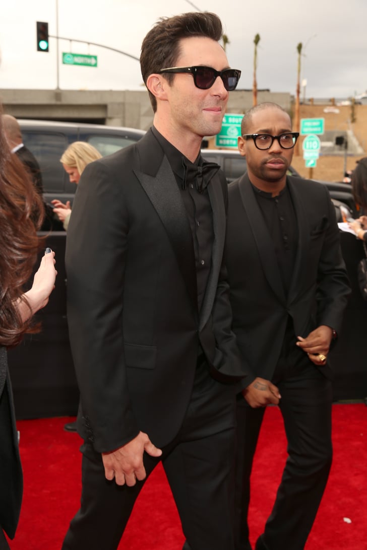 Adam Levine arrived at the Grammy Awards in an all-black suit. | Stars