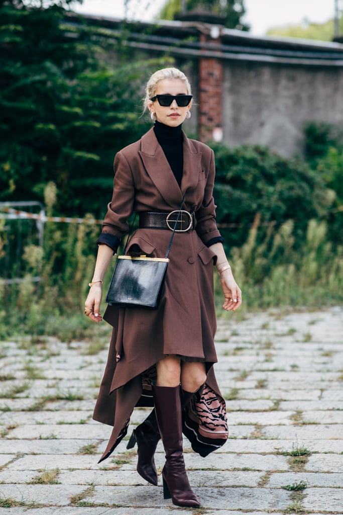 Style leather knee-high boots with a long blazer dress and turtleneck.