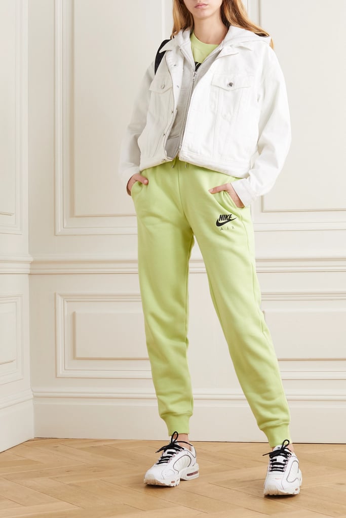 Nike Neon printed cotton-blend jersey track pants