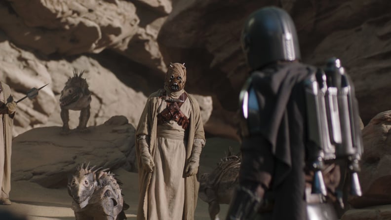 THE MANDALORIAN, from left: Tusken Raider, Pedro Pascal (back to camera - as the Mandalorian), 'Chapter 9: The Marshal', (Season 2, ep. 201, aired Oct. 30, 2020). photo: Disney+/Lucasfilm / Courtesy Everett Collection