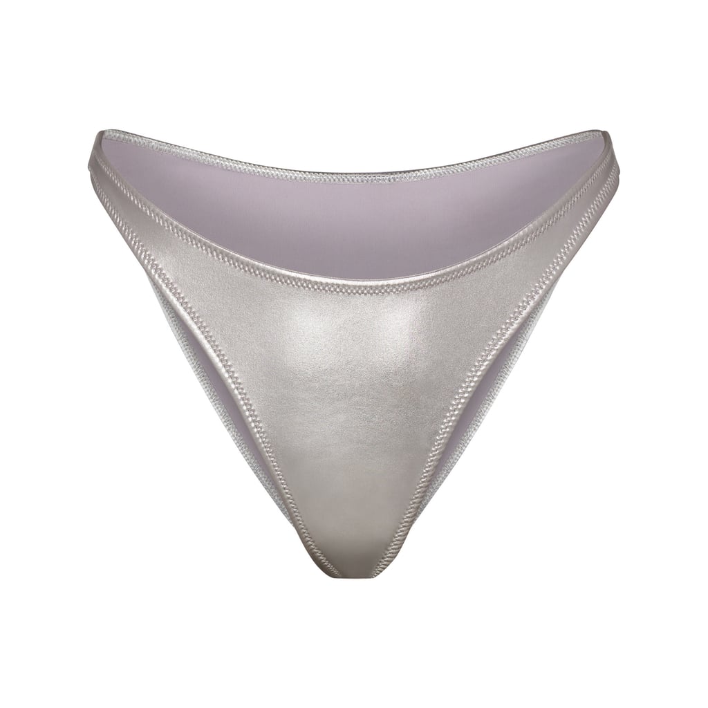 Skims Metallic Swim Dipped Mid-Waist Bottoms in Nickel ($48)