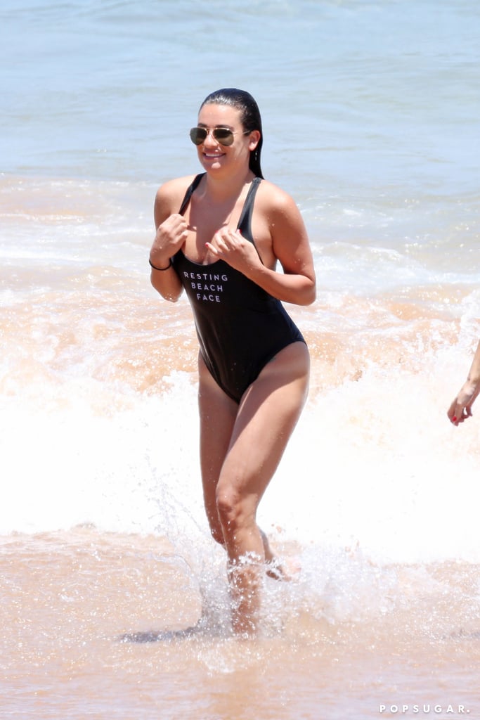 Lea Michele escaped to Hawaii with a group of girlfriends this week, and on Wednesday, the former Glee star was spotted hitting the ocean in Maui wearing a cheeky black Milly one-piece swimsuit that read "Resting Beach Face." Lea celebrated Memorial Day in a red "Bae-Watch" number, and back in February, we saw her paddleboarding in Maui wearing a "Beach Please" one-piece — so we're counting on her to keep her statement suit game strong all year long. 

    Related:

            
            
                                    
                            

            25 Sexy Pictures of Lea Michele&apos;s Bikini Body From Every Angle