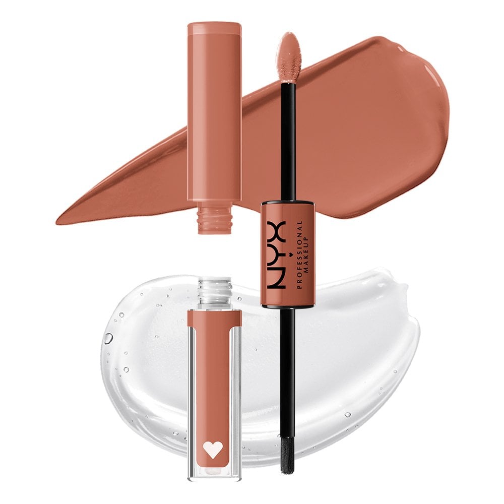 I opted for the shade Cash Flow. The product description boasts 16 hours of no-transfer wear with an ultra-glossy, glass-like finish. First, you apply the lipstick pigment side, let that dry for 90 seconds, and then top it off with the gloss side. Because I'm a rule follower, that's exactly what I did. The doe-foot applicator of the lip colour side has a nice point to it which allows you to get a precise application and the formula itself is so intensely pigmented that you only need one swipe. The clear gloss side has a brush applicator and is incredibly smooth but not sticky. 
After layering the gloss, I let it sit for another minute before I dared to touch it. Even after that time passed the gloss still felt wet — it doesn't really "dry" down like many other long-wear lipsticks. At this point, I was feeling a little nervous about how the transfer test would go but I grabbed a napkin and just went for it.