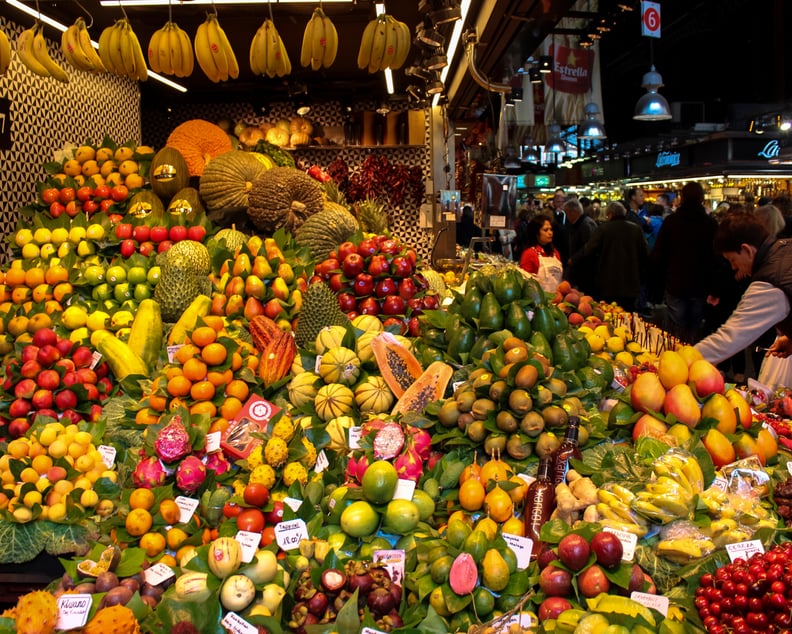 Taste exotic fruits and veggies at La Boqueria.