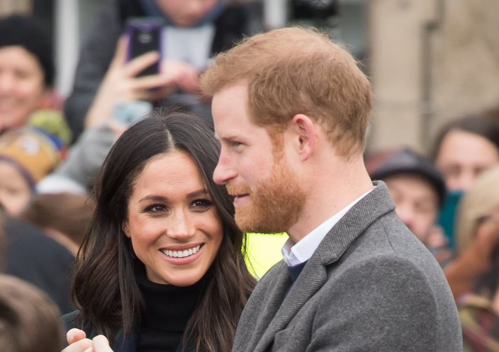 Meghan Markle Looking at Prince Harry Pictures