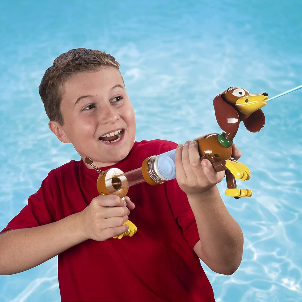 A Water Blaster: SwimWays Disney Toy Story Slinky Dog Water Blaster