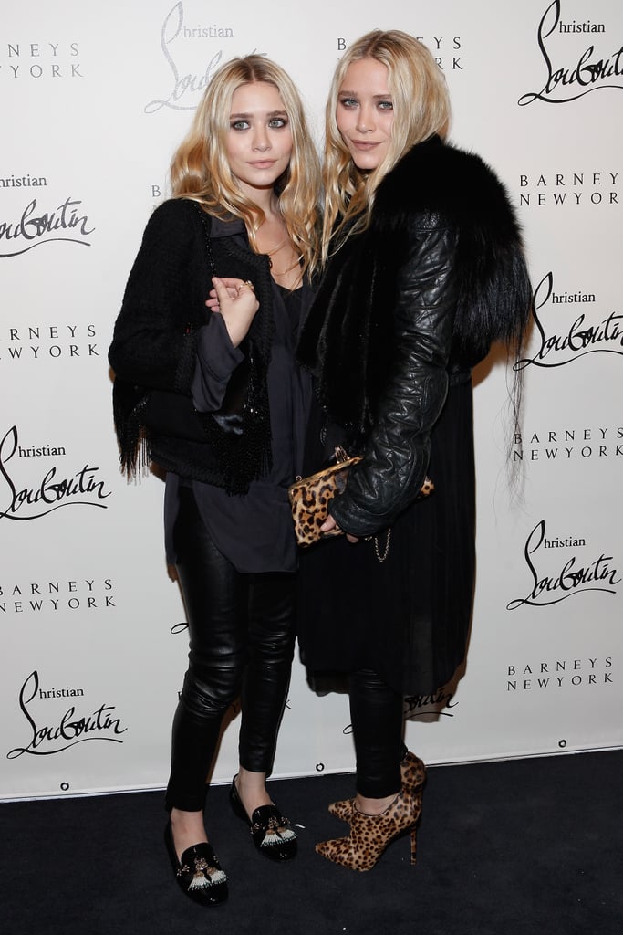 Twinning combo: For Christian Louboutin's November 2011 soiree the girls styled all-black ensembles with statement-making shoes.

Ashley juxtaposed edgy leather leggings with a smart tweed jacket and Christian Louboutin tasseled driving loafers.
Mary-Kate injected a pop of print with a leopard clutch and matching ankle booties, both by Christian Louboutin.