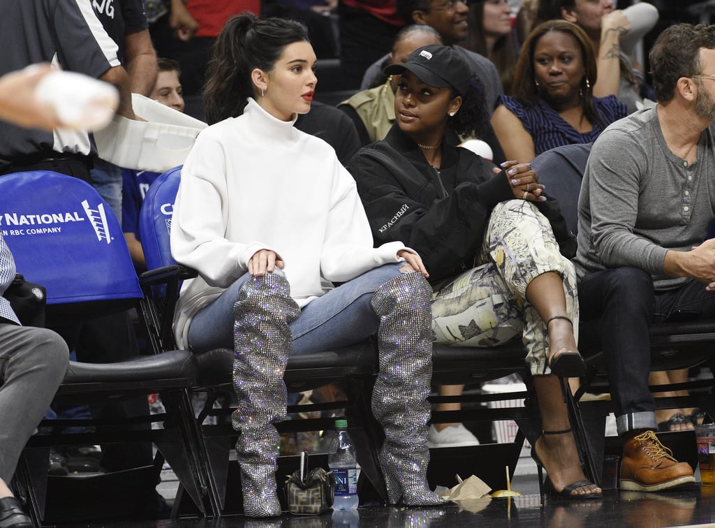 Kendall Jenner made sure to get the most out of her $10,000 Saint Laurent boots by wearing them twice: first to her birthday dinner, then to a basketball game where her rumored beau was playing.