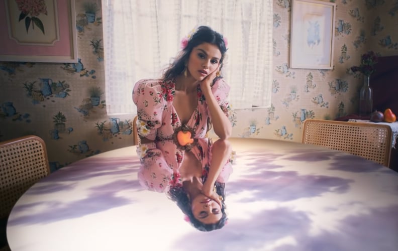 selena gomez pink floral dress Selena Gomez's floral print dress and opal earrings from the De Una Vez  video