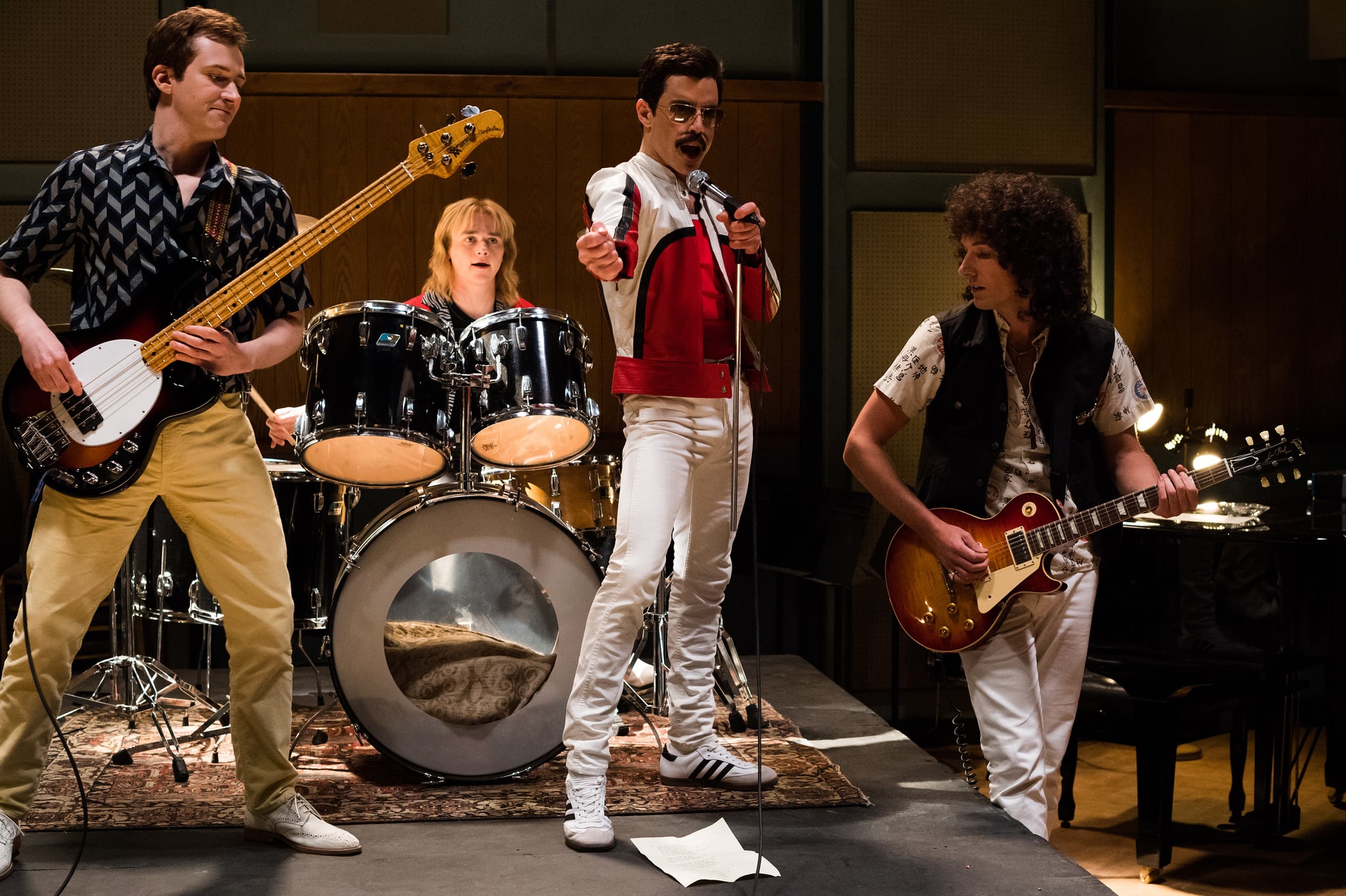 DF-25953 – L-R: Joe Mazzello (John Deacon), Ben Hardy (Roger Taylor), Rami Malek (Freddie Mercury), and Gwilym Lee (Brian May) star in Twentieth Century Fox's BOHEMIAN RHAPSODY. Photo Credit: Alex Bailey.