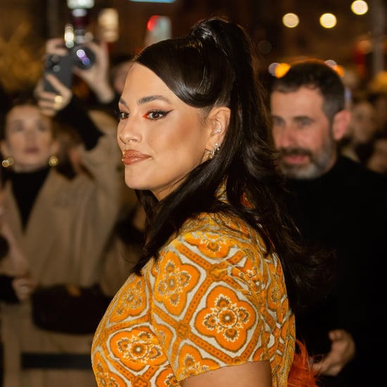 Ashley Graham Wears an Orange Miniskirt and Fur Coat at Etro