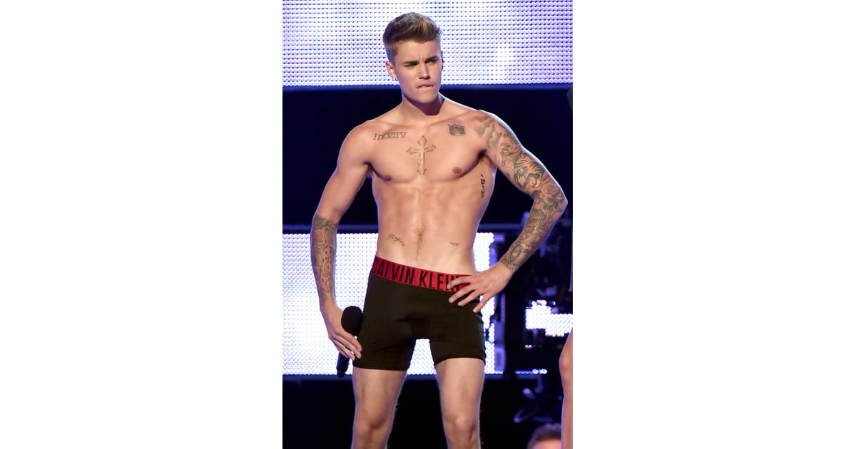 Justin Bieber S Onstage Strip Show The 21 Sexiest Shirtless Moments