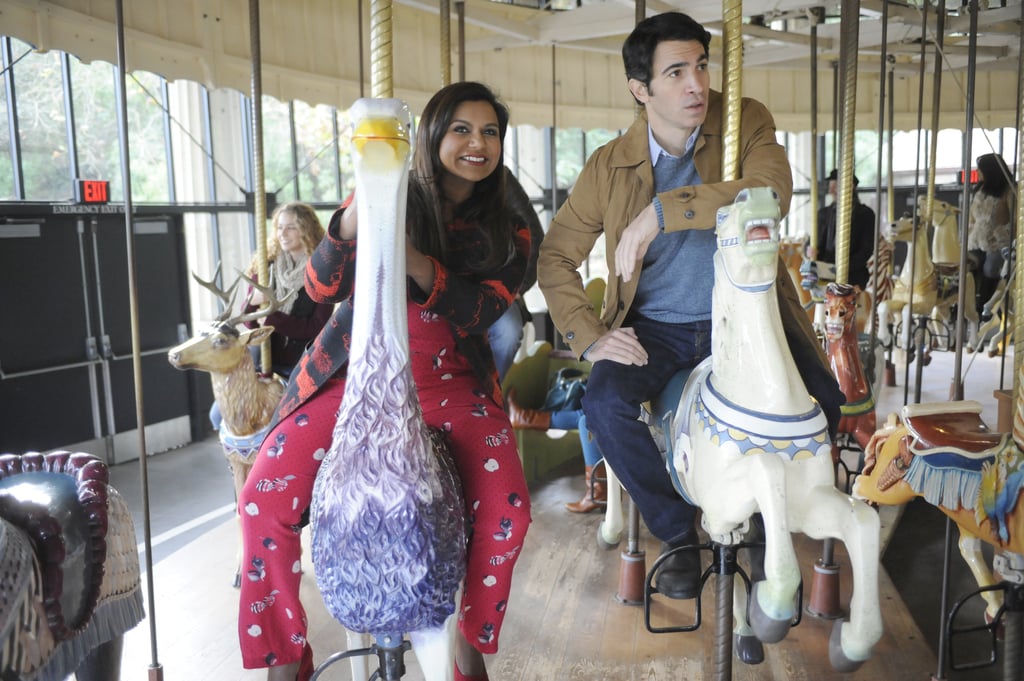 They hop on a carousel during their day in the city.