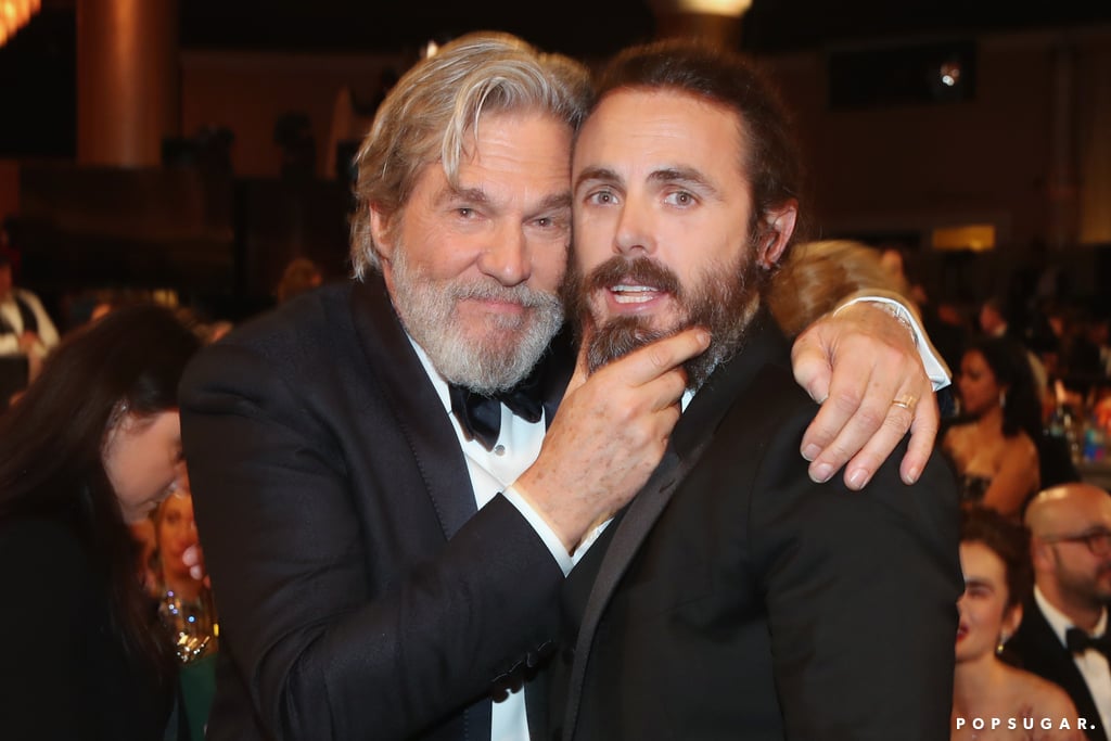 Jeff Bridges playfully grabbed Casey Affleck's beard.