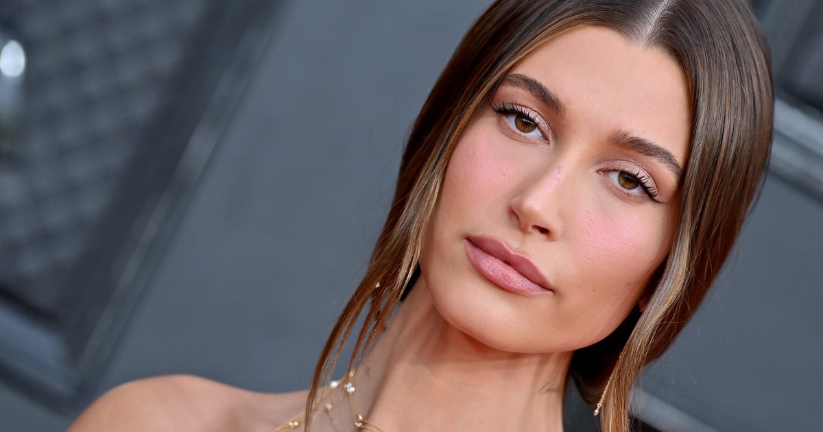 Hailey Bieber puts her stunning figure on display in a sheer lace bodysuit  for Victoria's Secret
